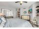A contemporary main bedroom features neutral walls, hardwood floors, and a sliding door closet at 241 Riverside Dr # 601, Daytona Beach, FL 32117