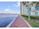 Brick-lined waterfront path alongside a high-rise condo with gorgeous water views at 241 Riverside Dr # 601, Daytona Beach, FL 32117