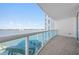 Balcony of this condo with views of the river and seating to enjoy the sun at 241 Riverside Dr # 704, Holly Hill, FL 32117