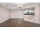 Dining area with elegant lighting, tile floors and an open layout connecting to the kitchen at 241 Riverside Dr # 704, Holly Hill, FL 32117