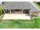 A top-down perspective showcases the covered patio and spacious lawn at 2454 Hyatt Creek Ln, Port Orange, FL 32128