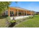 Beautiful backyard with covered lanai, landscaping, and lots of room to entertain at 2454 Hyatt Creek Ln, Port Orange, FL 32128