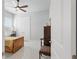 Bedroom features a ceiling fan, closet with double doors and vintage furniture at 2454 Hyatt Creek Ln, Port Orange, FL 32128