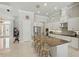 Beautiful kitchen with a spacious island with seating, modern appliances, and stylish finishes at 2454 Hyatt Creek Ln, Port Orange, FL 32128