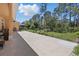 Extended patio offers ample space for outdoor entertaining and relaxation at 2454 Hyatt Creek Ln, Port Orange, FL 32128