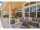 Inviting outdoor patio featuring a cozy seating area and fire pit at 2454 Hyatt Creek Ln, Port Orange, FL 32128