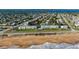 Aerial view highlighting the proximity of the property to the beach and surrounding neighborhood at 2480 Ocean Shore Blvd # 120, Ormond Beach, FL 32176