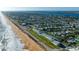 Beautiful aerial view showcases the close proximity of the property to the beach at 2480 Ocean Shore Blvd # 120, Ormond Beach, FL 32176