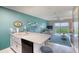 Open-concept kitchen with an island, modern appliances, and seamless flow into the living area at 2480 Ocean Shore Blvd # 120, Ormond Beach, FL 32176
