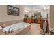Bathroom with soaking tub and double vanity featuring granite countertops and elegant lighting at 2515 S Atlantic Ave # 509, Daytona Beach, FL 32118