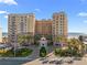 Luxurious beachfront condo building with lush landscaping and a grand entrance, offering upscale coastal living at 2515 S Atlantic Ave # 509, Daytona Beach, FL 32118