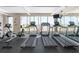 Well-equipped gym features treadmills and stationary bikes with a scenic view of the beach at 2515 S Atlantic Ave # 509, Daytona Beach, FL 32118