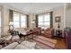 Inviting living room with large windows, comfortable seating, and stylish decor, perfect for relaxation and entertaining at 2515 S Atlantic Ave # 509, Daytona Beach, FL 32118