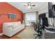 Living room with a white sofa, balcony, and comfortable workspace at 2515 S Atlantic Ave # 509, Daytona Beach, FL 32118