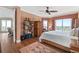 A spacious main bedroom featuring warm tones and a private balcony with scenic views at 2515 S Atlantic Ave # 509, Daytona Beach, FL 32118