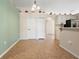 Dining area featuring tile floors and views into the kitchen at 2530 Leonard Dr, Deltona, FL 32725