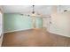 Bright, spacious living room featuring hardwood floors and a vaulted ceiling with an archway at 2530 Leonard Dr, Deltona, FL 32725