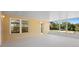 The screened patio offers a tranquil outdoor living space with views of the lush backyard at 2530 Leonard Dr, Deltona, FL 32725