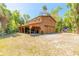 Spacious barn with covered parking and additional storage, perfect for equipment or recreational vehicles at 2646 Turnbull Bay Rd, New Smyrna Beach, FL 32168