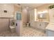 Luxurious bathroom featuring dual vanities, glass shower, and neutral tones, creating a spa-like oasis at 2646 Turnbull Bay Rd, New Smyrna Beach, FL 32168