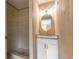 Updated bathroom with a tiled shower and a modern vanity at 2646 Turnbull Bay Rd, New Smyrna Beach, FL 32168