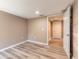 Bright bedroom with wood-look flooring and neutral paint at 2646 Turnbull Bay Rd, New Smyrna Beach, FL 32168