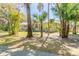 Charming single-story home with mature trees and a well-maintained lawn, offering a peaceful setting at 2646 Turnbull Bay Rd, New Smyrna Beach, FL 32168