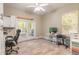 Bright office space with French doors leading to the patio, providing ample natural light and outdoor access at 2646 Turnbull Bay Rd, New Smyrna Beach, FL 32168