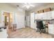 Spacious office featuring built-in cabinetry and views of an en suite bathroom, perfect for remote work or hobbies at 2646 Turnbull Bay Rd, New Smyrna Beach, FL 32168