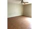 Bedroom featuring tile floors, ceiling fan, and neutral paint at 2684 Candler Dr, Deltona, FL 32725