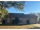 Charming single-story home with a well-maintained lawn and attached garage at 2684 Candler Dr, Deltona, FL 32725