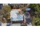Aerial view showcasing the property layout, including the home, garden, gazebo, and outdoor structures at 3005 Garden Rd, Eustis, FL 32726