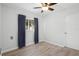 Simple bedroom with wood flooring and single window at 3005 Garden Rd, Eustis, FL 32726