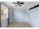 Cozy dining room area features tile floors, a ceiling fan, and a window for lots of natural light at 3005 Garden Rd, Eustis, FL 32726