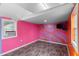 Bright studio features unique paint colors and wood-look floors, ready for your creative touch at 3005 Garden Rd, Eustis, FL 32726