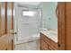 Clean bathroom with shower, toilet, vanity and tile flooring at 3041 Millstone Ave, Deltona, FL 32738