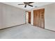 Bright, carpeted bedroom with natural light, closet, and ensuite bathroom access at 3041 Millstone Ave, Deltona, FL 32738