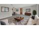 Inviting living room with comfortable seating, modern decor, and natural light at 3041 Millstone Ave, Deltona, FL 32738