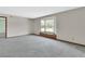 Bright living room with bay window and neutral tones at 3041 Millstone Ave, Deltona, FL 32738