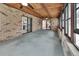 Spacious sunroom with brick walls, wood-paneled ceilings, and access to other rooms at 3041 Millstone Ave, Deltona, FL 32738