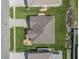 Aerial view of home, showing the roof, landscaping and driveway at 307 Mariners Gate Dr, Edgewater, FL 32141