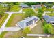 Spacious home featuring solar panels and a brick patio in a beautiful neighborhood at 3104 Umbrella Tree Dr, Edgewater, FL 32141