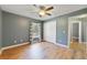 Cozy bedroom with a window, closet, and wood-look flooring at 3211 Hidden Crest Ln, Deland, FL 32724