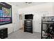 Well-organized bedroom featuring a modern media center and ample storage at 322 E Merimont Ln, Ormond Beach, FL 32174