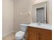 Clean bathroom with tile flooring, a single sink vanity, and a standard toilet at 3237 Cranston St, Deltona, FL 32738