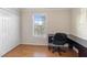 Comfortable bedroom with a spacious closet and laminate wood floors at 3237 Cranston St, Deltona, FL 32738