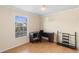 Bedroom with laminate flooring, a modern ceiling fan, and a window for natural light at 3237 Cranston St, Deltona, FL 32738