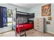 Shared bedroom with bunkbeds, gray dresser, soft carpet, and ample natural light at 3845 Arborvitae Way, Deland, FL 32724