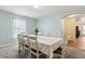 Bright dining room with light walls and lots of natural light at 3845 Arborvitae Way, Deland, FL 32724
