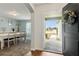 Inviting entryway leading to the dining room and front yard view at 3845 Arborvitae Way, Deland, FL 32724